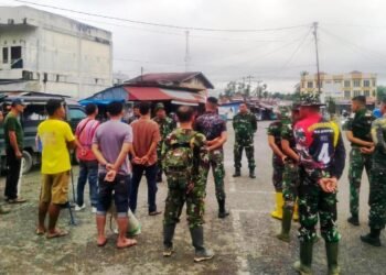 Pasar Pulau Punjung dibersihkan Melalui Aksi Goro Satgas TMMD Kodim 0310/SSD 