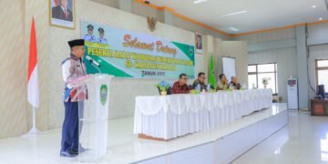 Pimpin Rakor Pemnag, dalam Raut Kecewa Bupati Pasaman Soroti Masalah Disiplin Perangkat Nagari