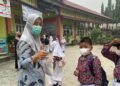 bagikan Masker