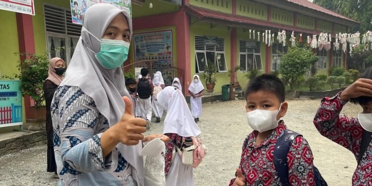 bagikan Masker